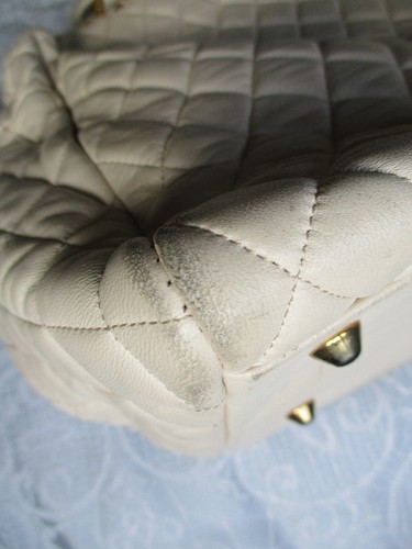 Fontanelli - Soft cream quilted leather handbag with side tassel - Picture 11 of 13