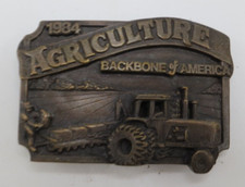 BELT BUCKLE Agriculture The Backbone of America 1984 tractor farmer field vtg