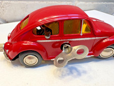 VINTAGE SCHUCO WIND-UP 1046 VOLKSWAGEN MICRO-RACER RED with KEY  INSERT