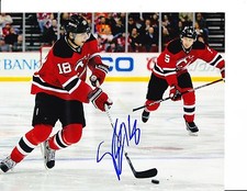 NEW JERSEY DEVILS STEVE BERNIER SIGNED LOOKING TO PASS 8X10