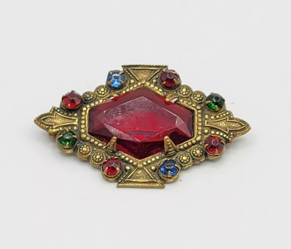 Ornate brooch online