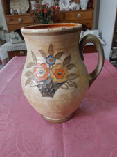 CHARLOTTE RHEAD SINGLE HANDLE VASE . CIRCA 1930s. 26CM TALL X 17CM ACROSS
