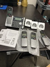 AT&T CL83464 Cordless Phone System w/ 4 Handsets, Base, Charging Docks, Manual