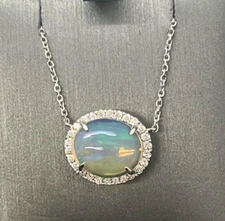 Lady's 14k White Gold Fashion Necklace with Opal 30097