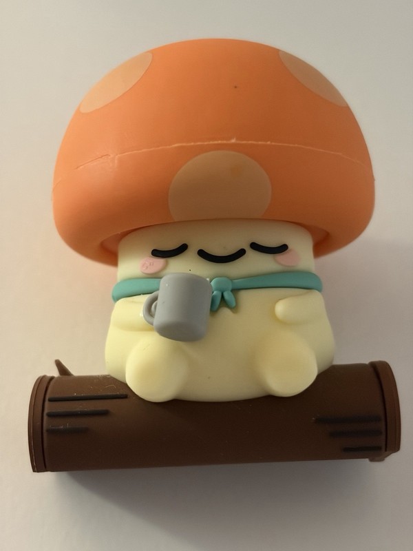 Japanese Art Toy Orange White Brown Mushroom Figurine Sitting on Log Holding mug