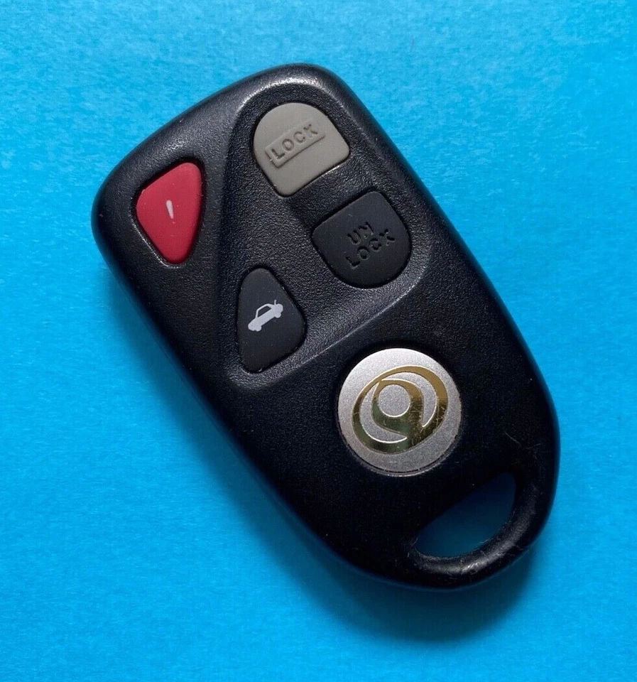 OEM 1995-1999 MAZDA MILLENIA 929 CONTROL REMOTO SIN LLAVE 4 BOTONES KPU41012 ~ ¡COMO NUEVO + LOGOTIPO! Foto 4 de 4