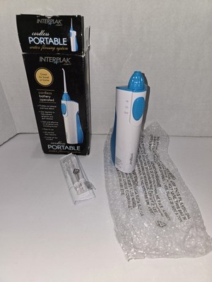 Interplak Cordless Portable Water Flossing System W /Two Water Jet Tips NIB