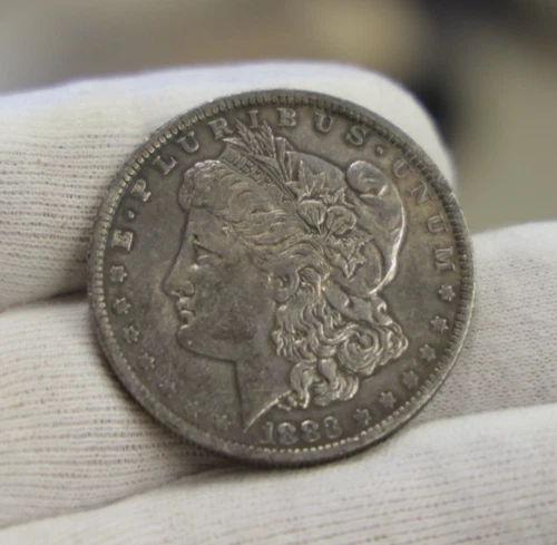 1883 O US Morgan Silver Dollar $1 XF (Cleaned)