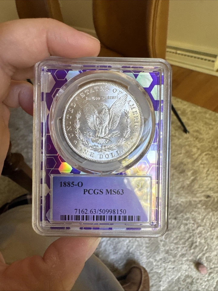 Dólar de plata Morgan 1885-O graduación profesional MS63 estado como nuevo Foto 2 de 2