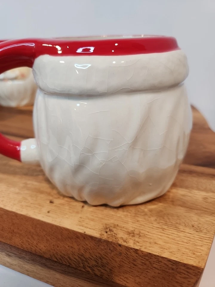 Boston Warehouse Trading Corp Juego de 4 tazas de Papá Noel ojos cerrados sonrientes 4x4 Foto 3 de 4