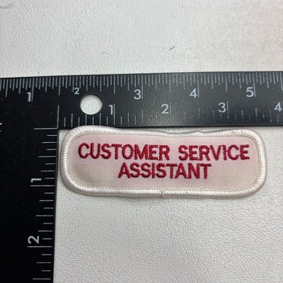Vtg Has-Color-Bleed CUSTOMER SERVICE ASSISTANT Tab Patch 50KE
