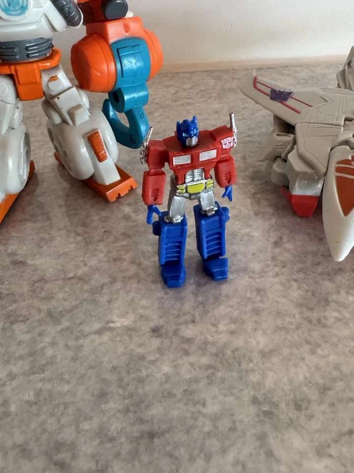 Lote de bots de rescate pequeños Transformers Decepticon, Last Knight y Playskool Heroes Foto 3 de 4