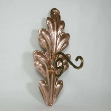 Antique copper wall hook, with oak leaf design and twisted metal hook.