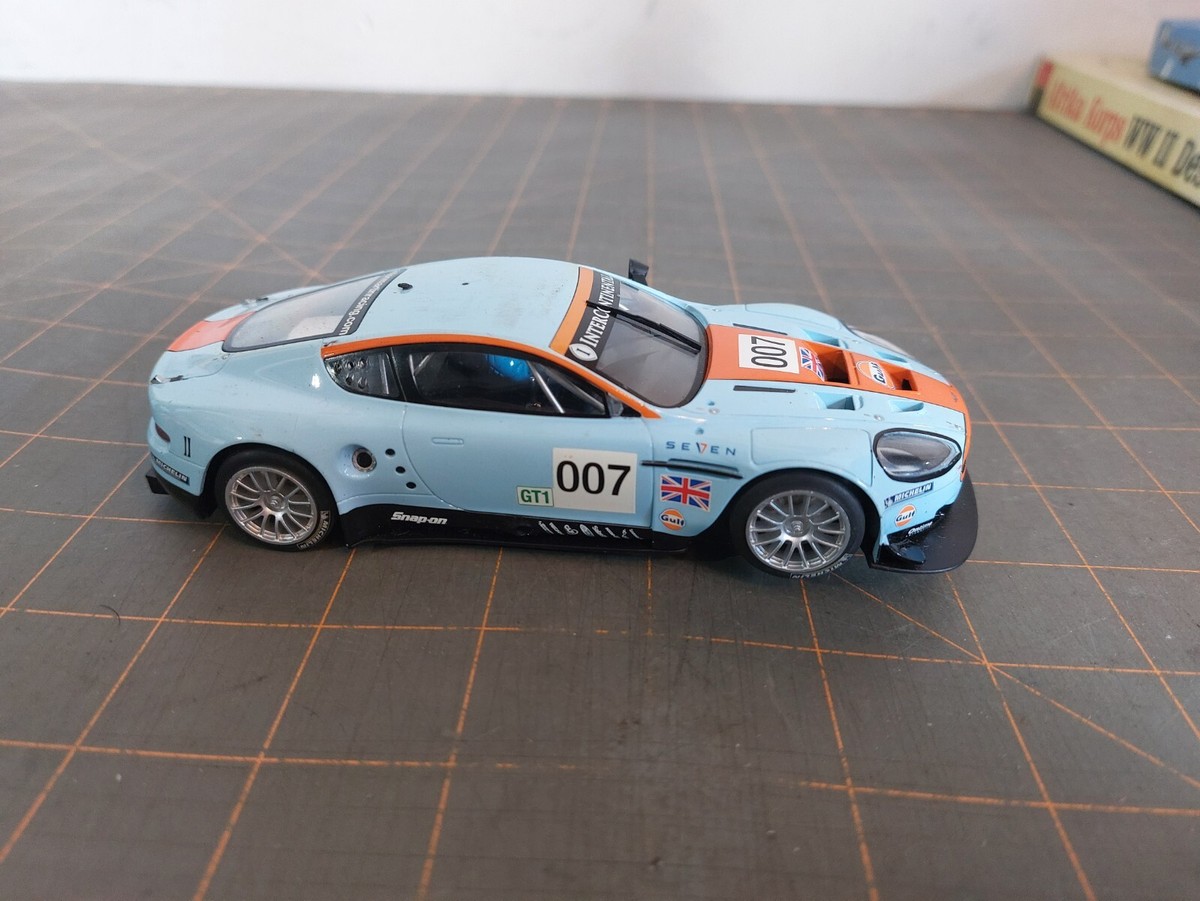 ミニカー ASTON MARTIN DBR9 007 Scalextric Amazon.com: Scalextric Aston Martin DBR9 ROFGO Gulf Edition