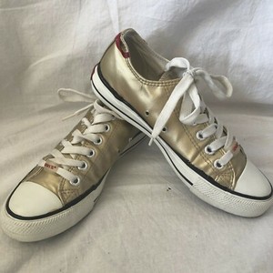 gold tennis shoes womens