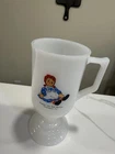 vintage Glasbake white milk glass pedestal mug featuring Raggedy Ann,