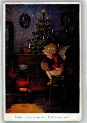 39891295 - Angel sitting with muff in front of stove next to Christmas tree M. Munk No.