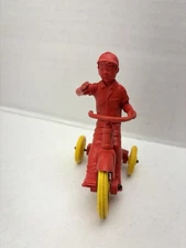 Auburn Rubber Tricycle with Boy Yellow and Red 1950's