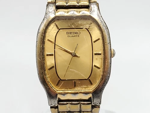 Vintage Seiko Quartz Watch New Battery V701-5H20 Gold Tone Adjustable Band 27mm