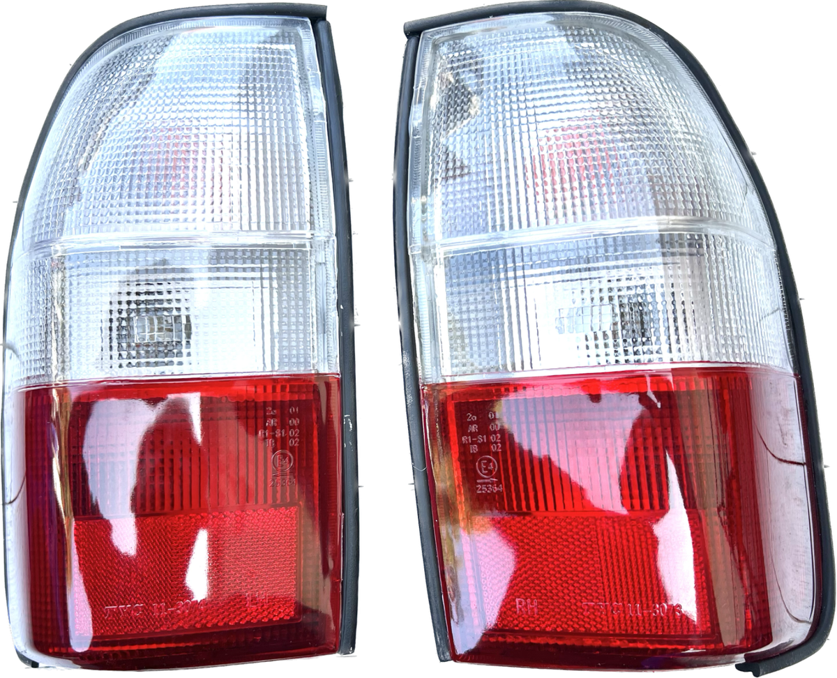 MITSUBISHI L200 K74T MODEL 2002 06 PAIR TAIL LIGHTS LH RH NEW