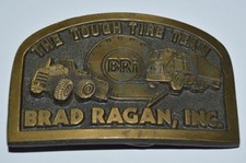 Vintage Brad Ragan Inc The Tough Tire Team Brass Tone Construction Belt Buckle