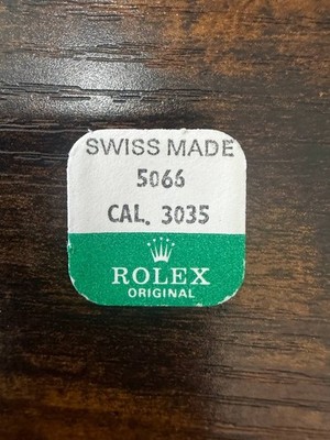 ROLEX-SPRING CLIP -FACTORY SEALED- CALIBER 3035 PART 5066-1 0.150mm