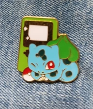 BULBASAUR WITH GAMEBOY"POKEMON" ENAMEL / LAPEL/ BROOCH PIN-NIP-NEXT DAY SHIPPING