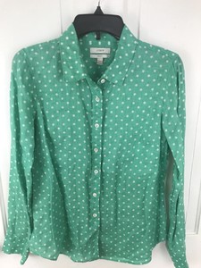 green and white polka dot shirt