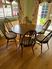Ercol dining table and 6 chairs 2are carvers very good condition