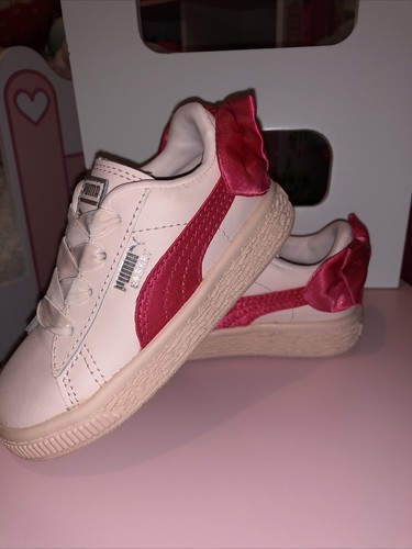 pink puma trainers with bow