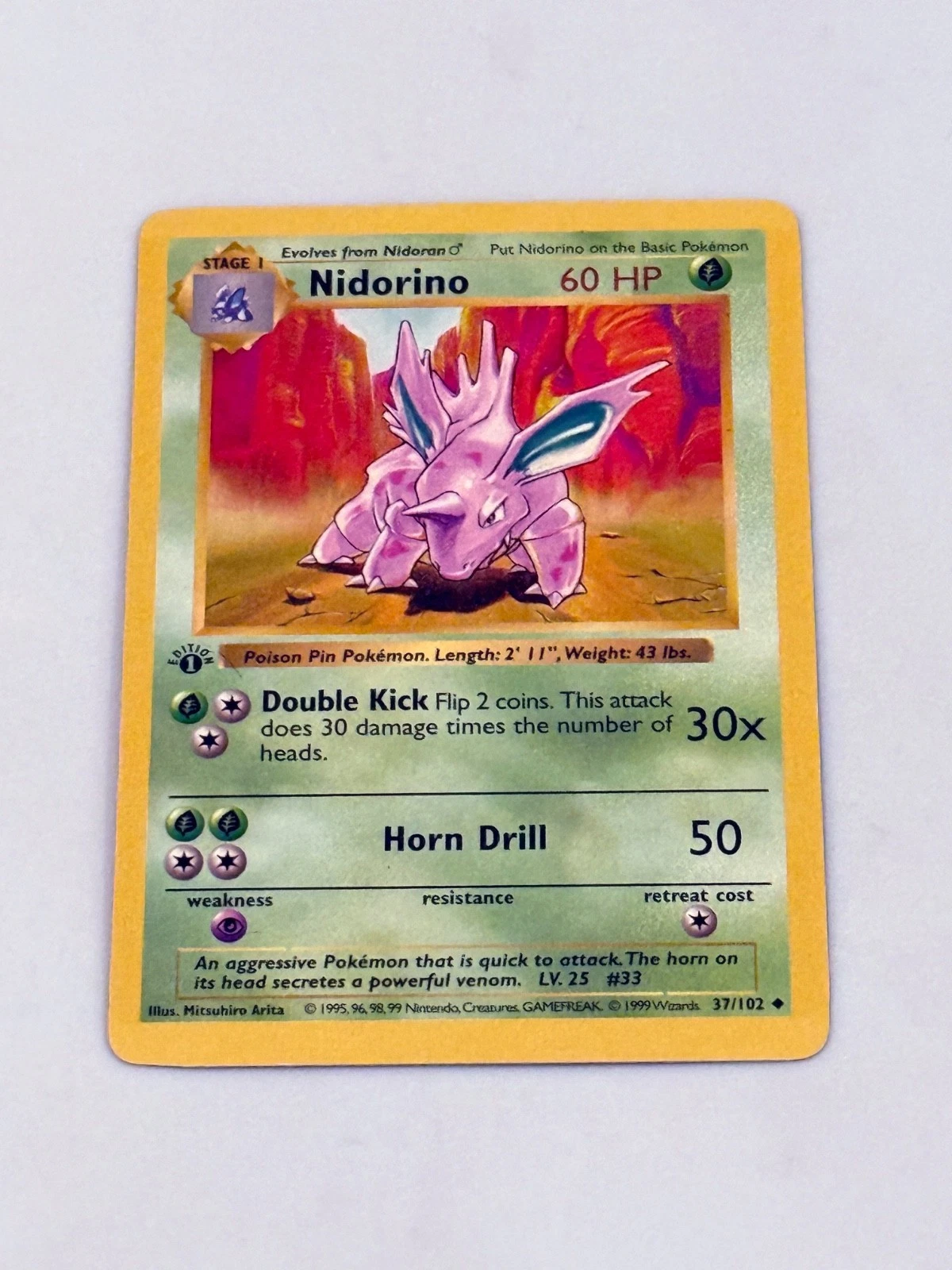 1st Edition Nidorino Pokemon Card 1999 Base Set Wizards of the Coast