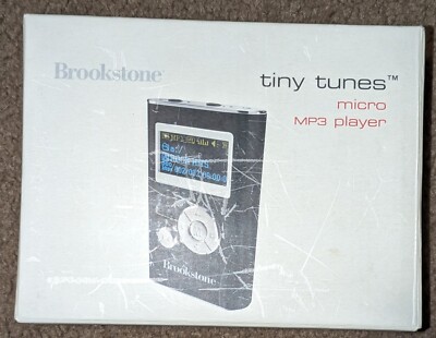 Brookstone: Tiny Tunes - Micro MP3 Player - Black - Blank Screen - Used