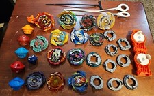 Beyblades Lot of Spinners  Parts, Launchers, Ripcords Huge Lot Plastic  Metal
