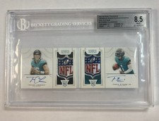 National Treasures Trevor Lawrence / Etienne dual NFL SHIELD AUTO BOOKLET RC 1/1