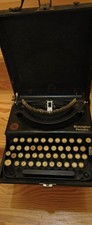 vintage typewriter working with case thumbnail