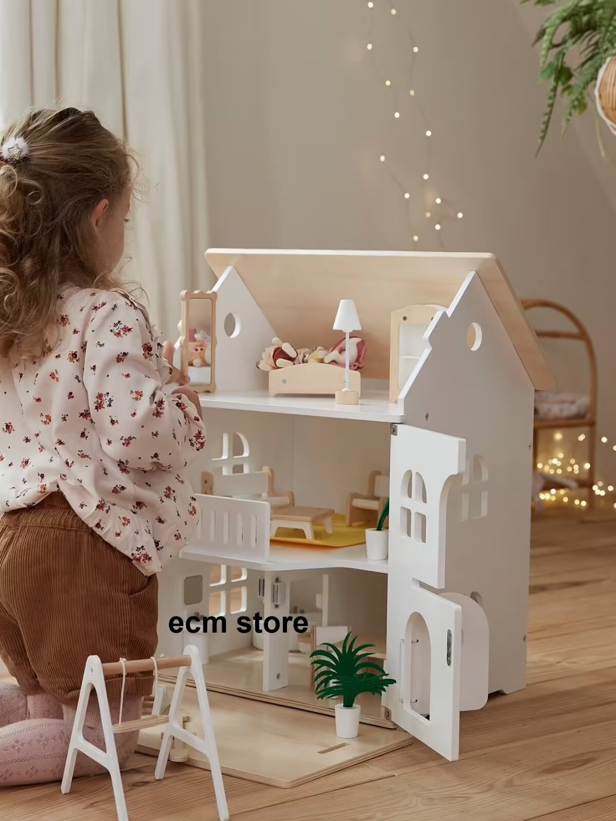 Maison de poupées Vertbaudet blanche pour imaginer des histoires