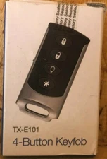 Brand New Interlogix TX-E101 Four Button Chrome Wireless Keyfob LED confirmation