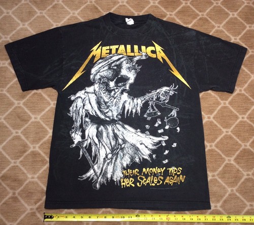 Metallica “Their Money Tips Her Scales 