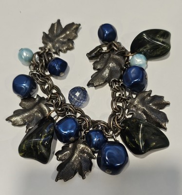 Vintage Charm bracelet blue green plastic dangles antiqued silver tone leaves