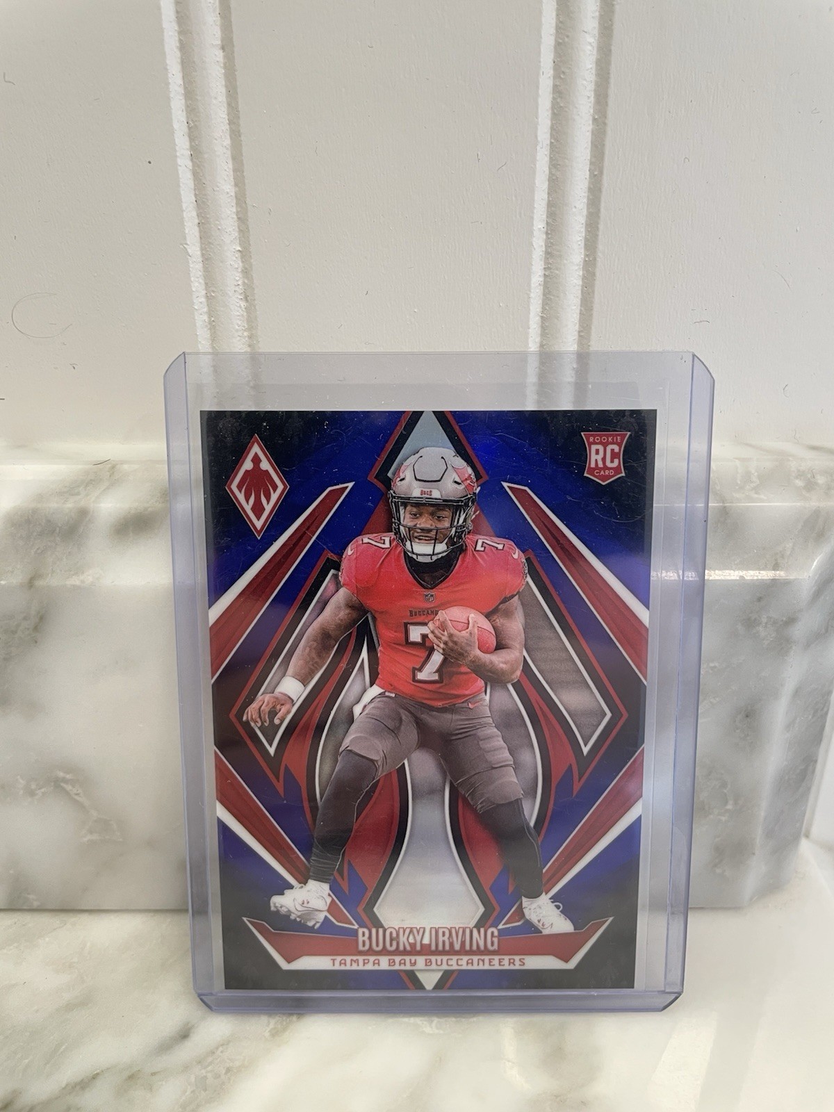 2024 Panini Phoenix - Rookies Bucky Irving #166 Blue Fade /249 (RC)