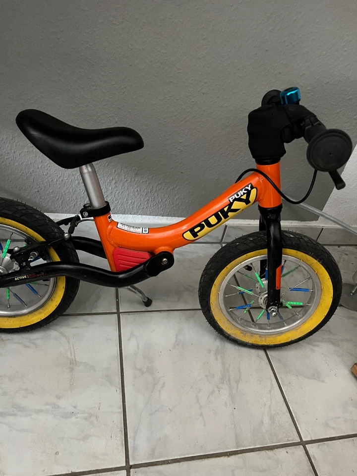 PUKY Alu Laufrad orange LR Ride mit Bremse, Klingel und Seitenständer - Bild 2 von 4