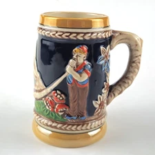 NOVELTY GERMANY BEER STEIN  WITH MAKER MARK: MAIDEN & MAN WITH ALPHORN    LF