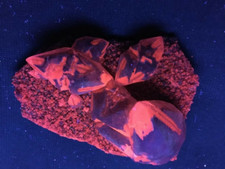 KB: BRIGHT! FL. RED SW CALCITE XLS. ON CALCITE MATRIX FROM ROMANIA