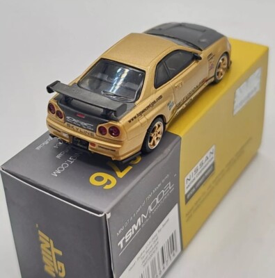 Nissan Skyline GT-R (R34) Top Secret Gold Chrome - Mini GT MGT