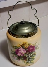 1920's Biscuit BARREL MADE IN ENGLAND. BRASS LOOK LID AND HANDLE.