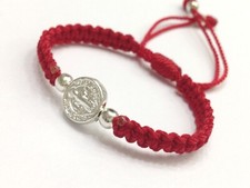 St. Benedict bracelet evil eye protects the hand-woven with red thread. macrame