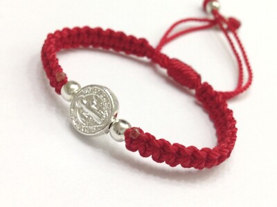 St. Benedict bracelet evil eye protects the hand-woven with red thread. macrame