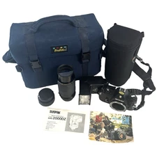 Nikon EM Camera w/ 2 Lens, Manuals, Sunpak Flash, & Bag- Untested