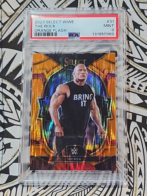 Dwayne The Rock Johnson 2023 Select WWE #31 Orange Flash Prizm PSA 9 Mint (968)
