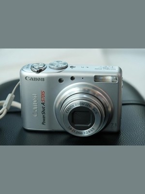 Canon PowerShot A570 IS Digital Camera Silver 7.1MP 4X Zoom w Strap Tested Works